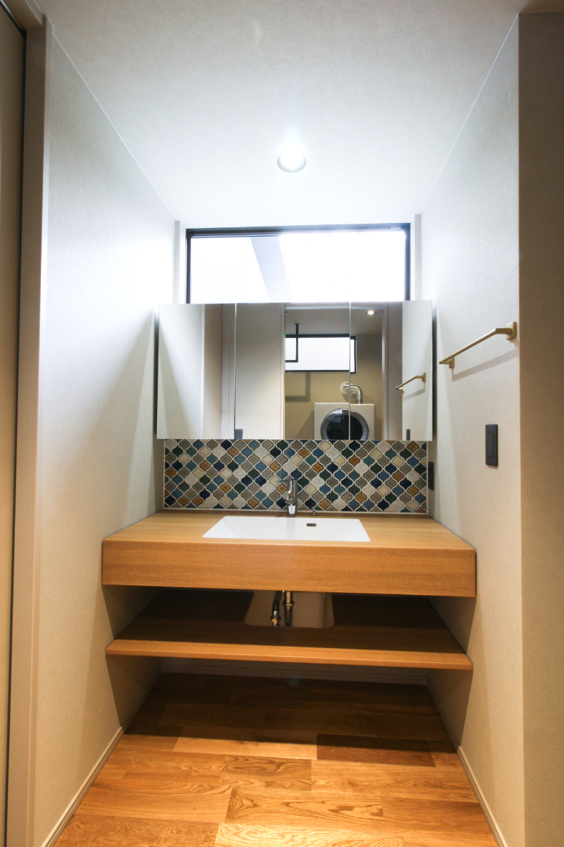 ガレージつきの中庭を囲んだ平屋のお家